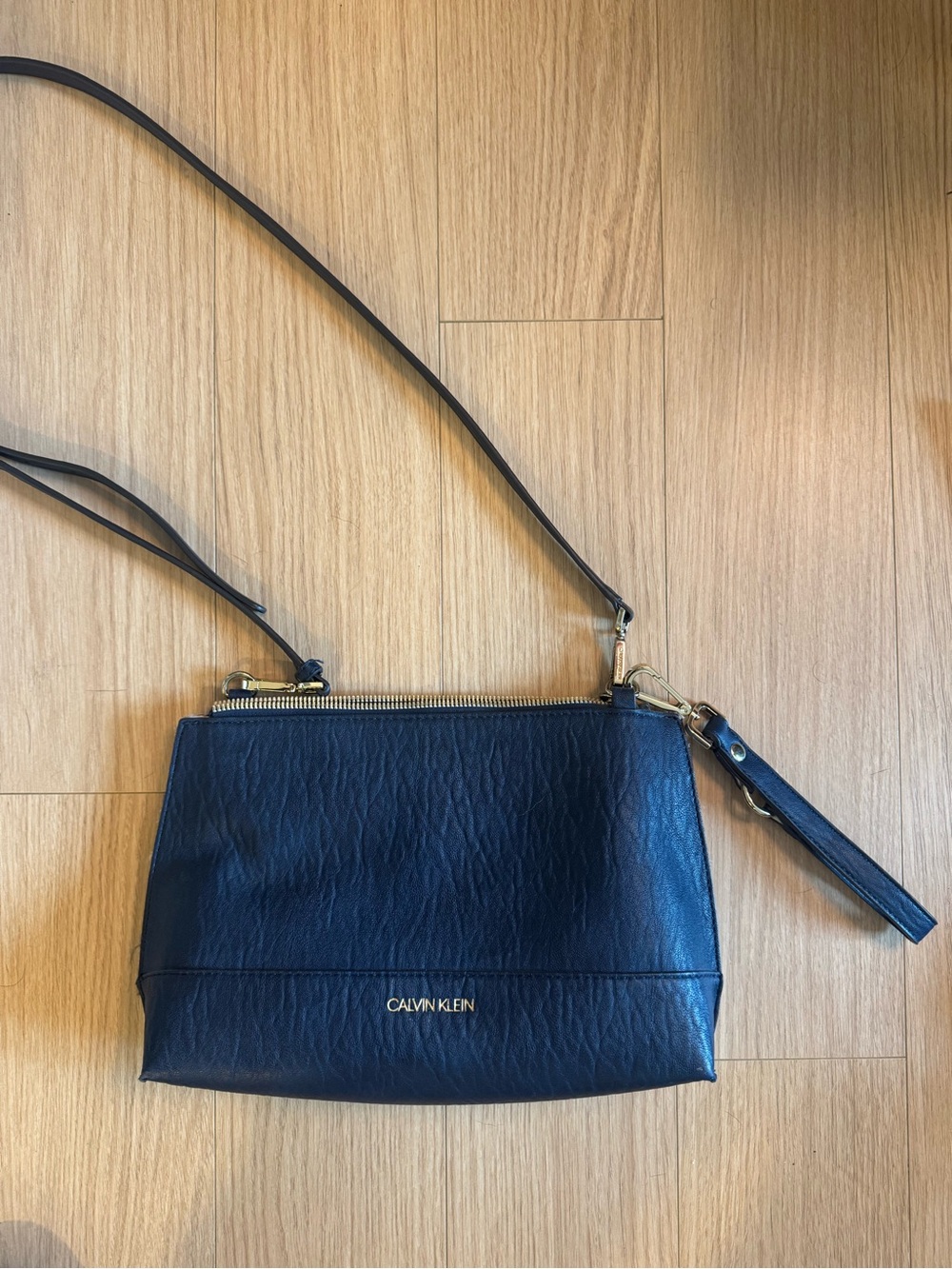 Calvin Klein Black Leather Crossbody Bag with Gold Hardware